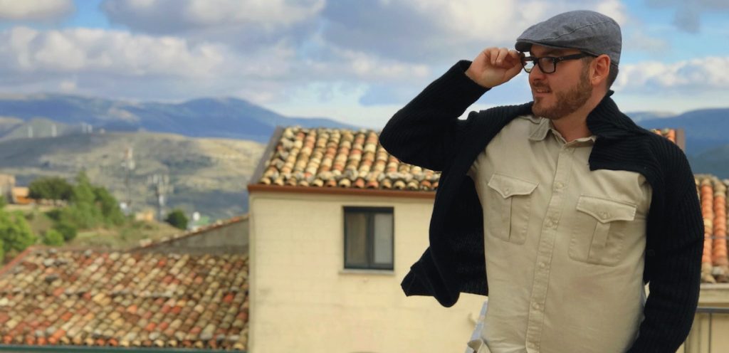 Italian Citizenship by Descent . YouTube influencer Rafael Di Furia overlooking Italian landscape.