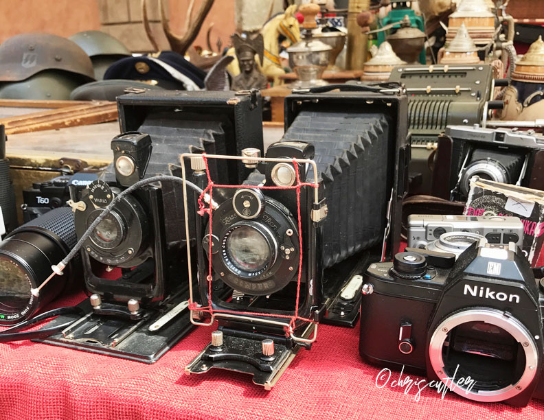 antique cameras on a table