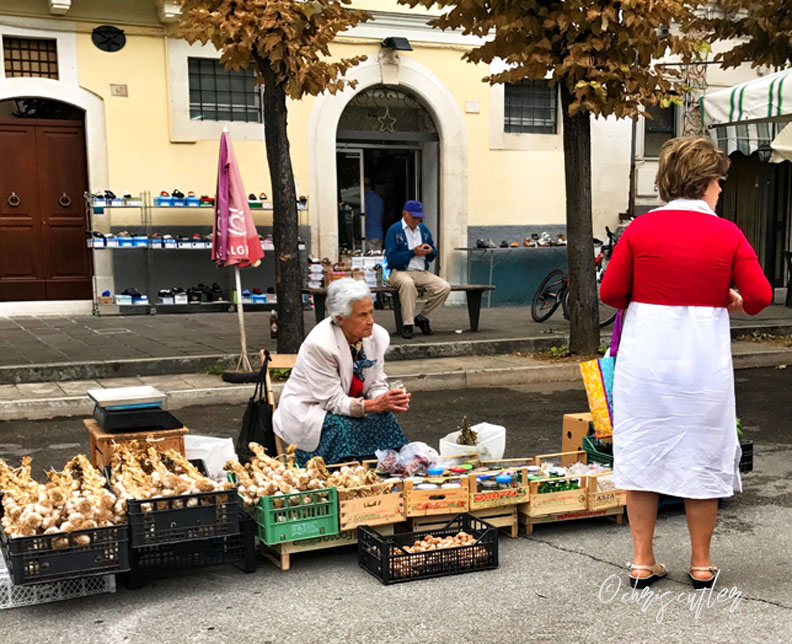 woman waiting for customers at market