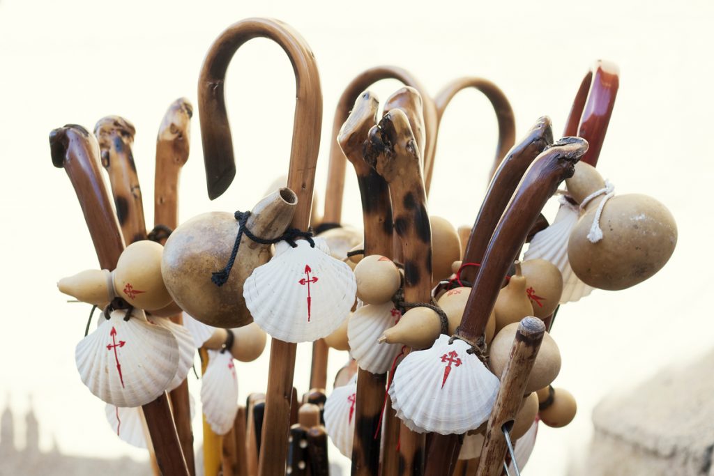 shell scallop sign marks with sticks in Way of St James , Camino de Santiago, to Compostela, Galicia, Spain