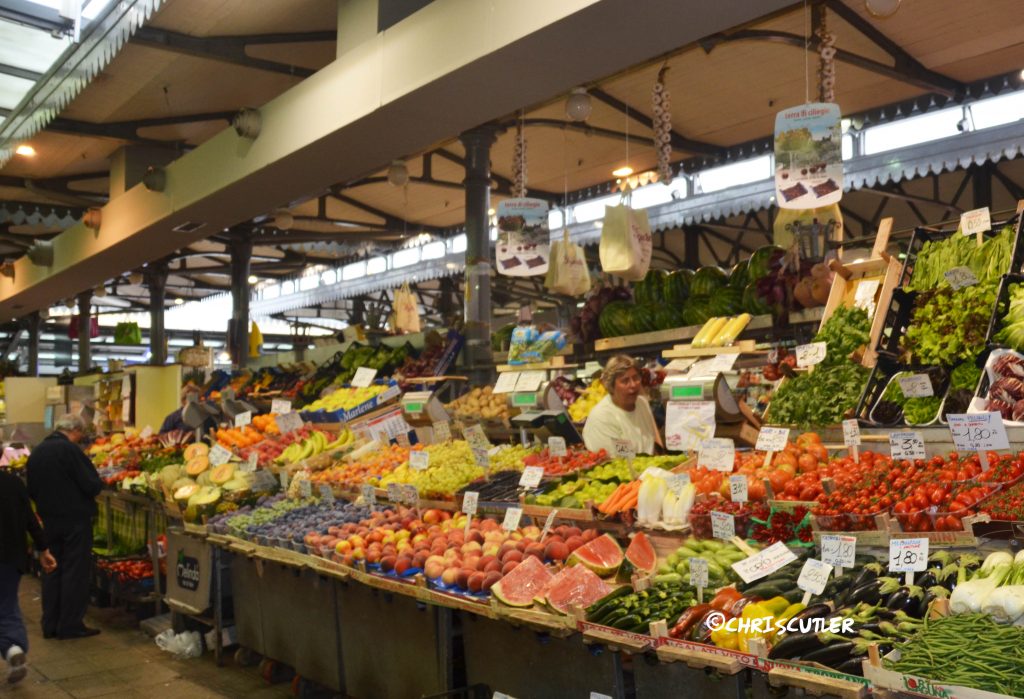 Italian markets: Mercato Albinelli produce stalls in Modena.