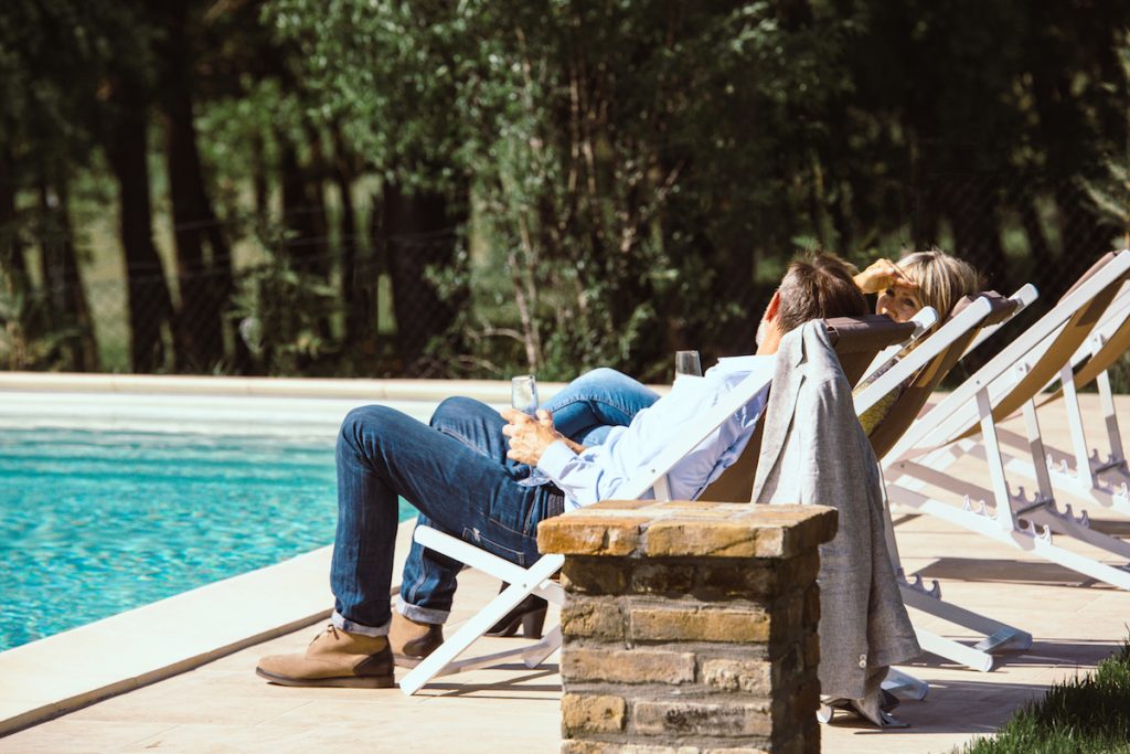  in Italy: Mark and Sara Hayes owners of No. 18 Casa di Capagna by pool.
