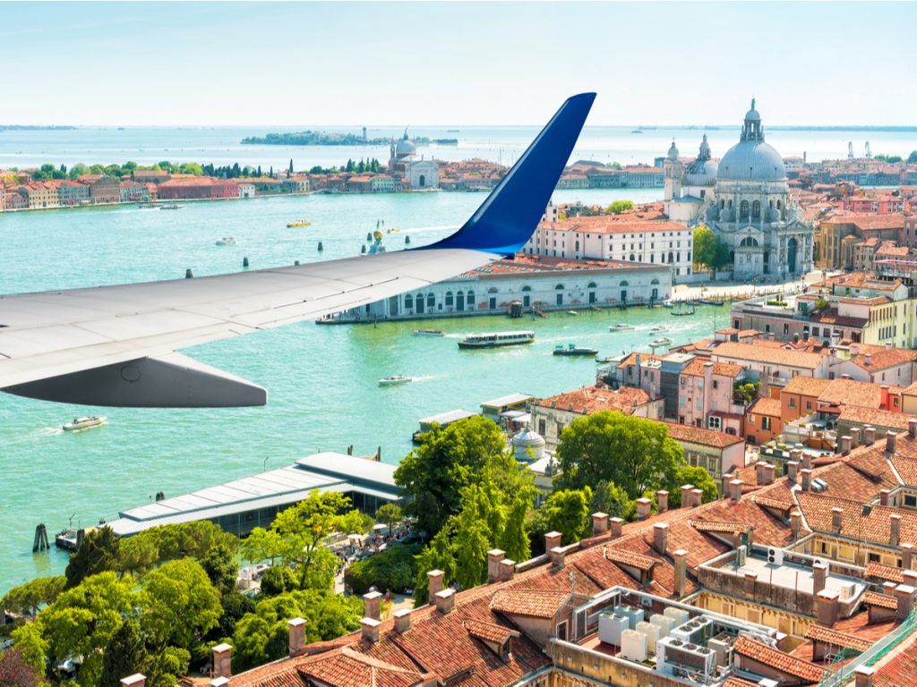 Quaratine-free flights from US to Italy: aerial view from plane over Venice