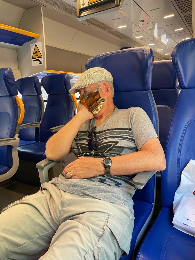 Sleeping man on train