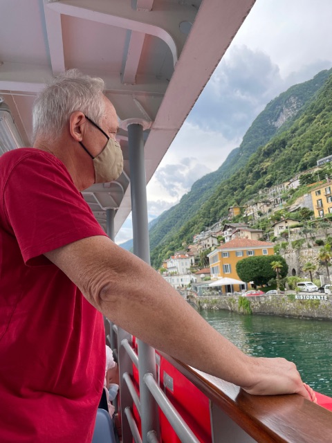 Man looking at shore from ship