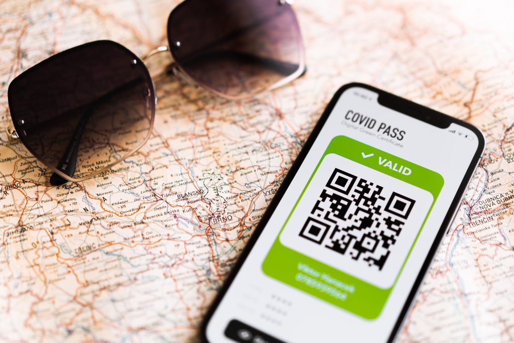 Summer travel to Italy: Phone with digital green pass