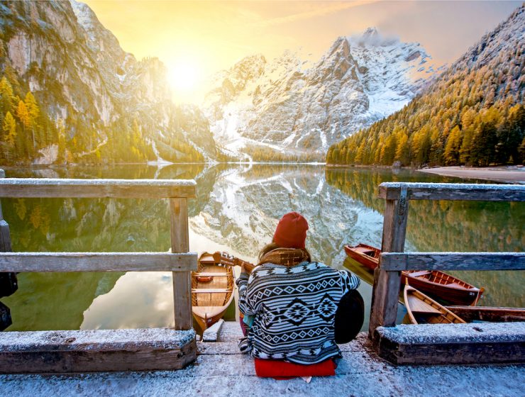 traveling to italy in 2022 | person on bridge overlooking Italian Dolomites