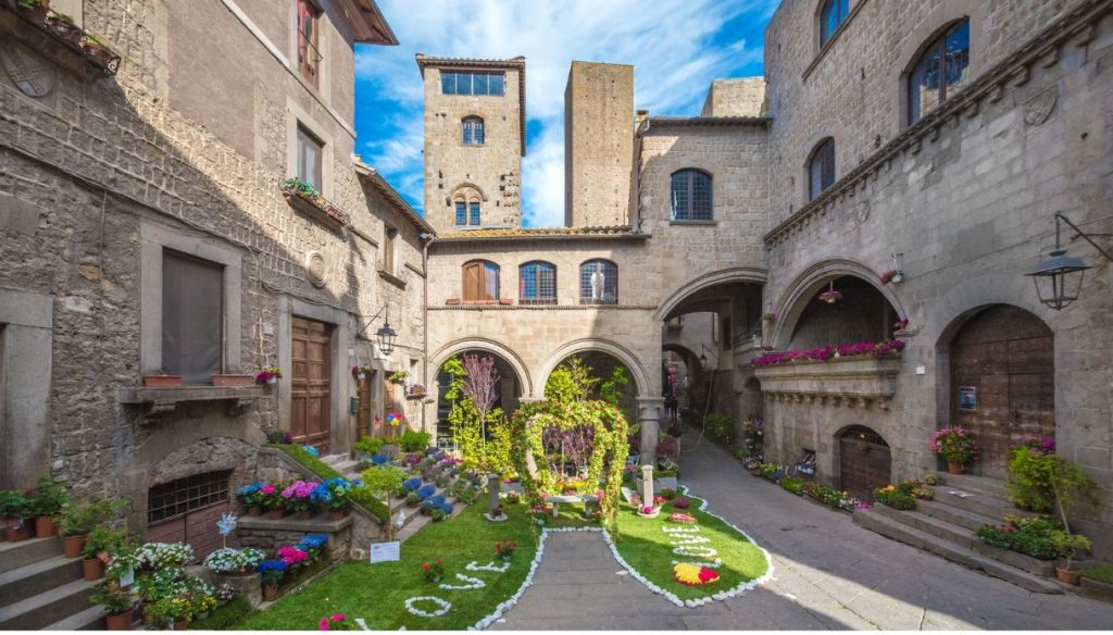 Tuscia in Fiore gray stones and flowers