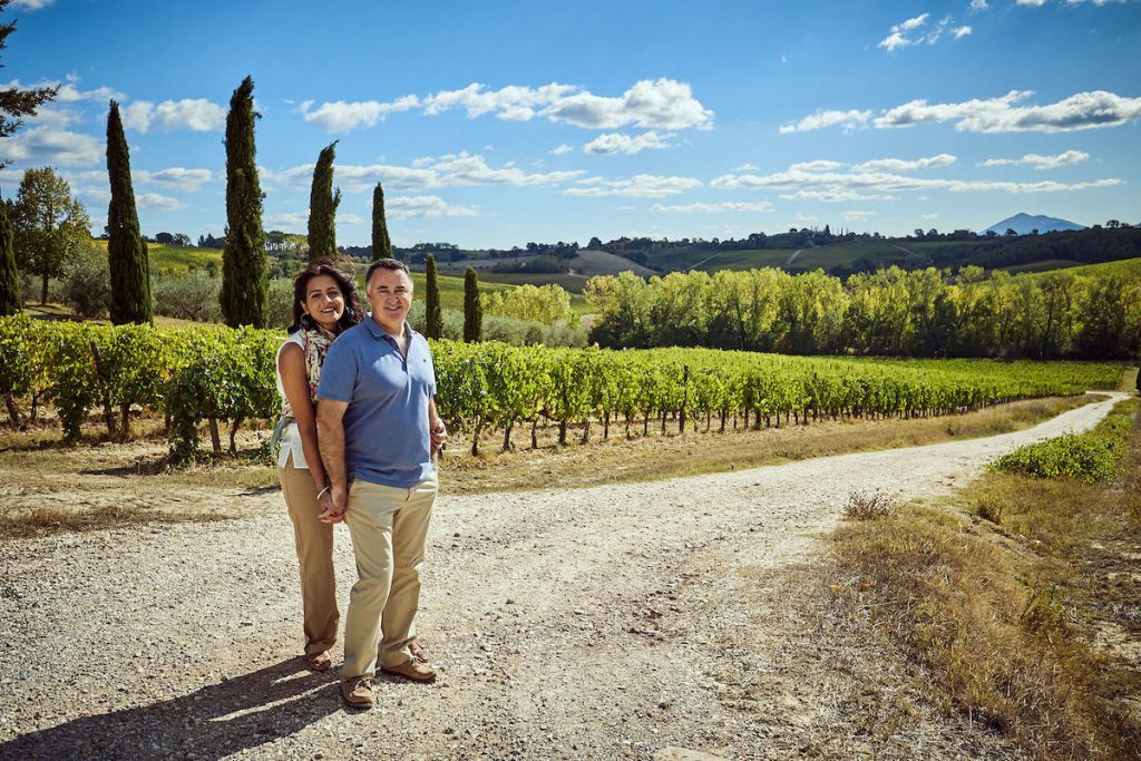 Poggio Golo Paari and Niall owners - couple in vineyard in Tuscany