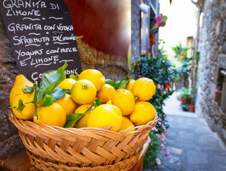 wicker basket with lemons on street in Italy during Primavera