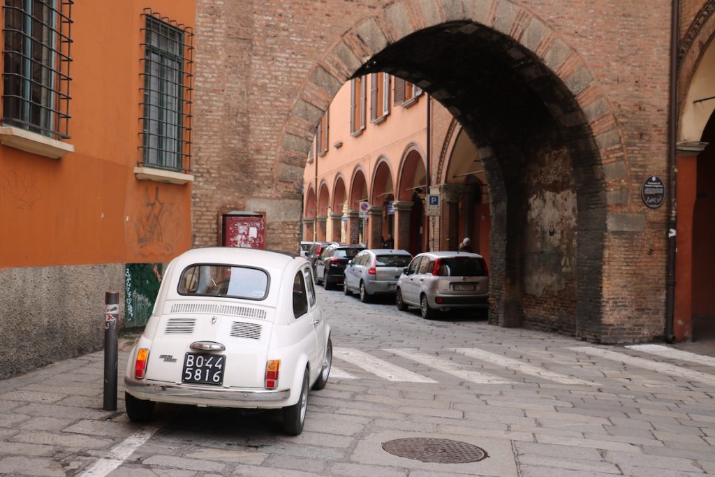 Italian stereotypes - driving in Italy - cars parked on street in Italy