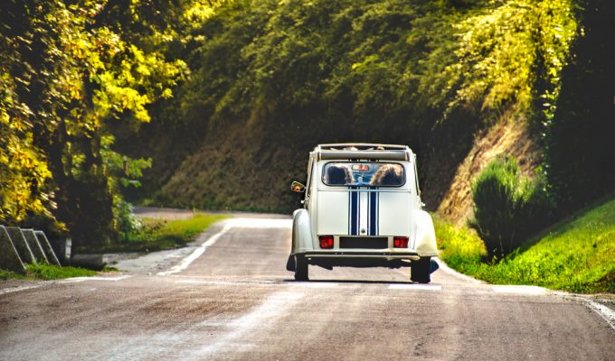Fiat from behind driving in Italian countryside