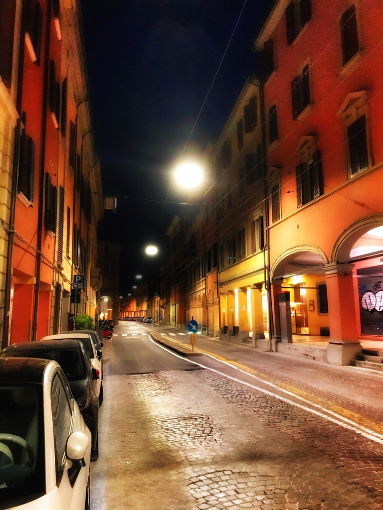 night scene, Via Santo Stefano, Bologna. Living in Italy