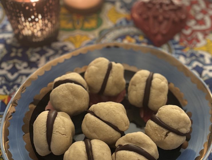Baci di dama cookies on plate