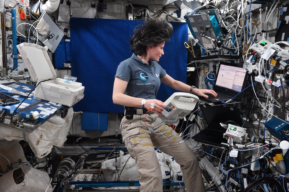 Samantha Cristoforetti 4 working on the NutriSS experiment aboard International Space Station (c) ESA:NASA