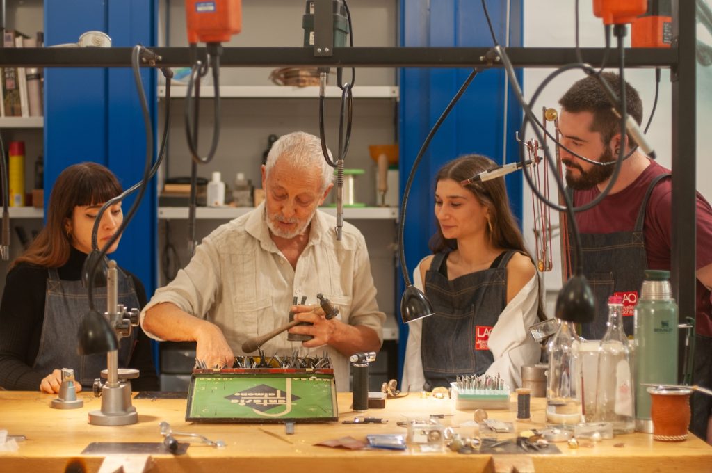 Le Arti Orafe jewelry school in Florence, students learning.