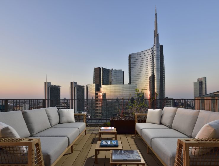 Stunning Milan sunset skyline view from Milano Verticale rooftop, a beautiful sight for those deciding where to stay in Milan.