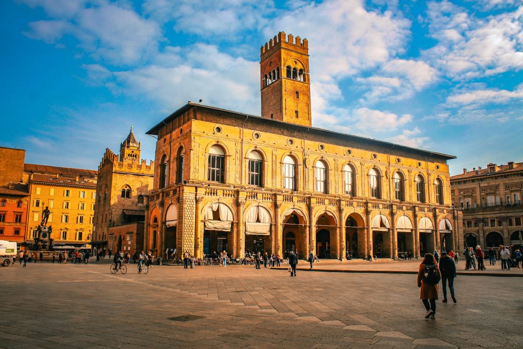 The iconic Piazza Maggiore in Bologna, an easily accessible city for day trips from Milan.
