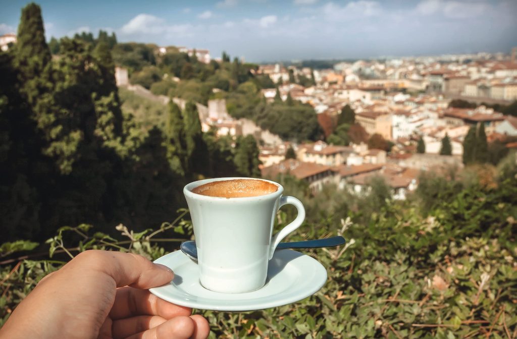 Italian Coffee Culture - espresso over cityscape of Florence, Italy