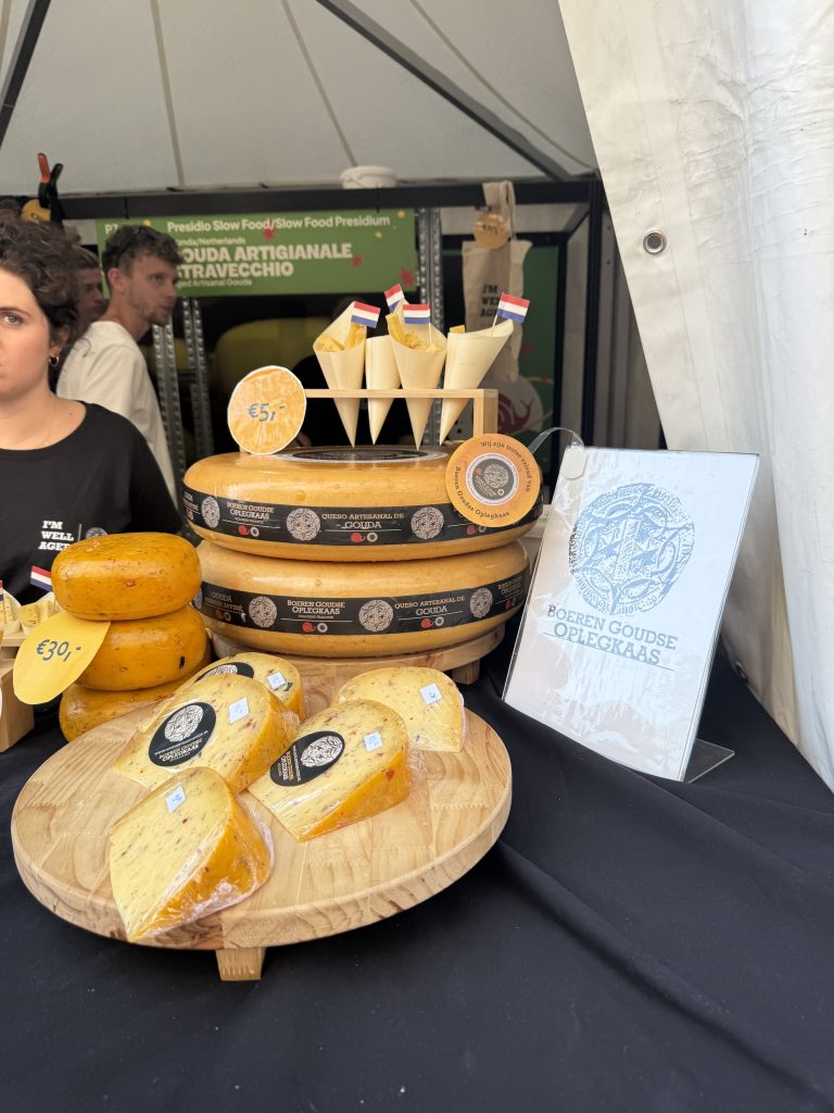 Visitors sampling local cheese in Bra, Langhe region