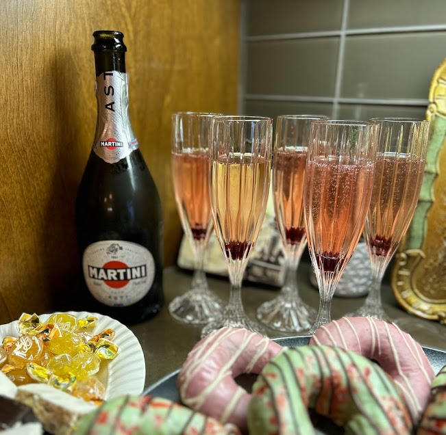 Glasses of Asti Spumante with amarene cherries