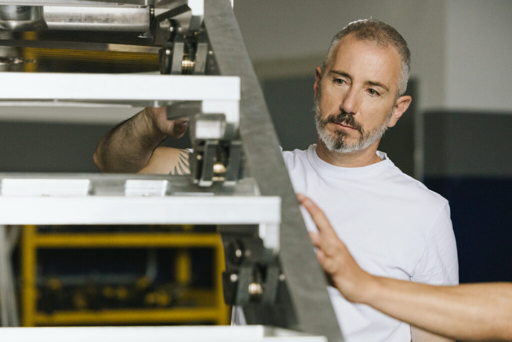 Federico Rossi overseeing yacht construction and design modifications at the Rossinavi shipyard