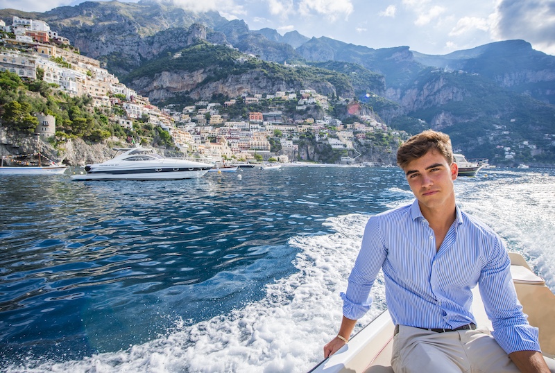 Danilo Romolini on boat with Positano background