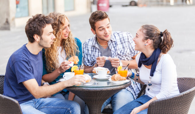 Group of Friends Having a Traditional Italian Breakfast