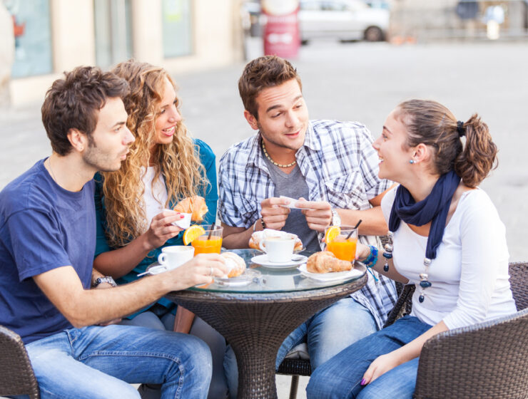 Group of Friends Having a Traditional Italian Breakfast