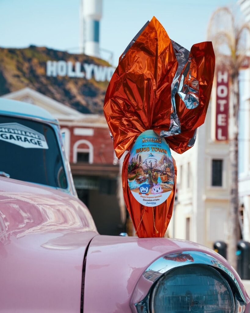 Italian Easter egg on pink car at Movieland, Italy