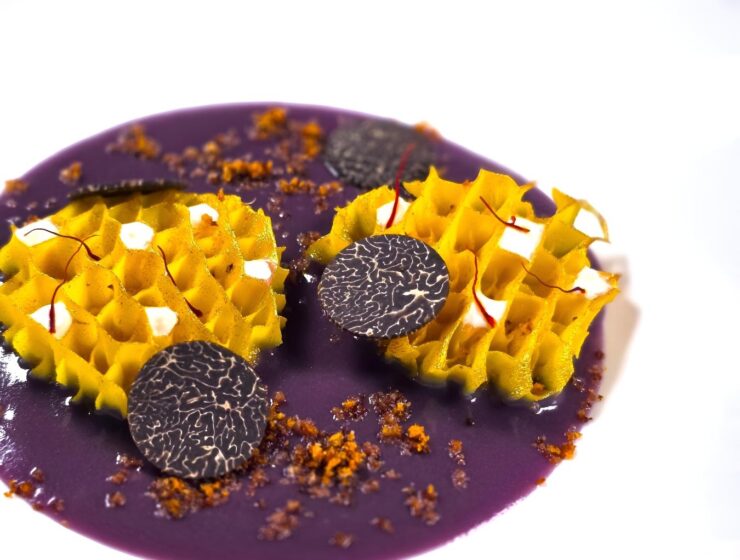 Saffron beehive tripe on purple potato purée with black truffle and Parmigiano gelée for Festa della Donna