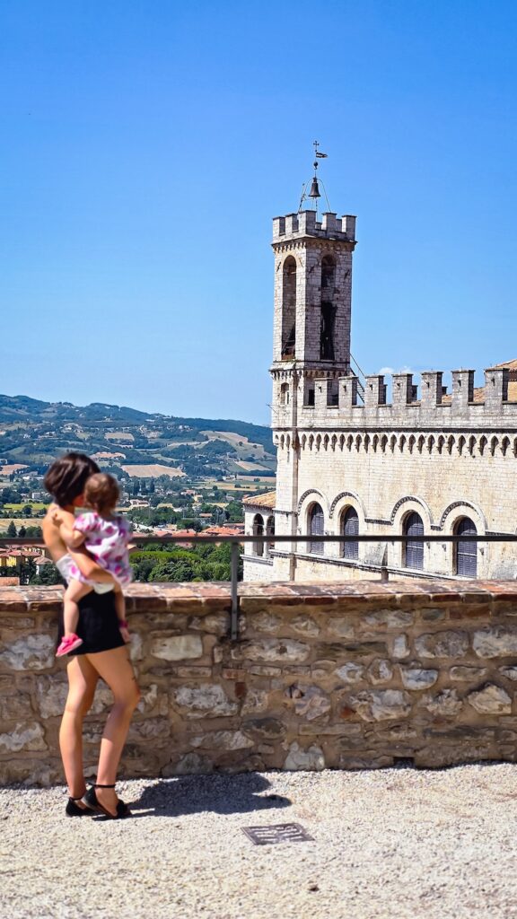 woman and child overlooking Palazzo Ducale in Gubbio