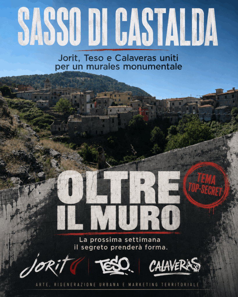 Public art project Oltre il Muro transforming a wall in Sasso di Castalda, Basilicata