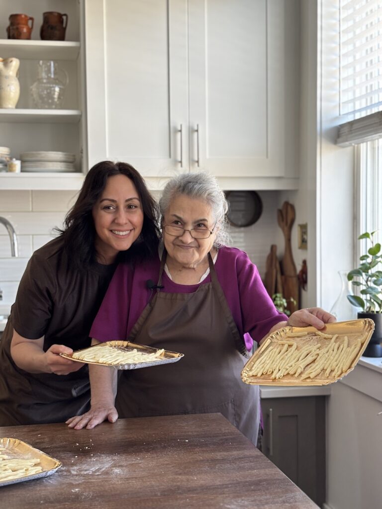Daniela Sfara and her mother preparing homemade pasta in Canada during Italian Heritage Month