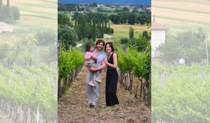 Guests in the vineyards of Mevante overlooking the Umbrian countryside near Bevagna