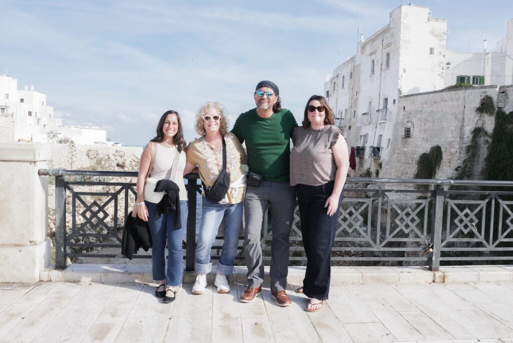 Angela Isherwood with guests in Puglia during an Olive & Atlas small group journey in Italy.