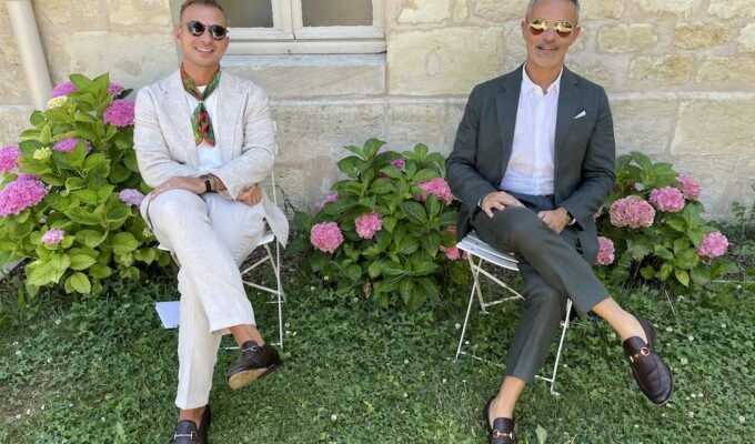 Dustin and Luigi outside their home in an Abruzzo village after relocating from Canada to Italy