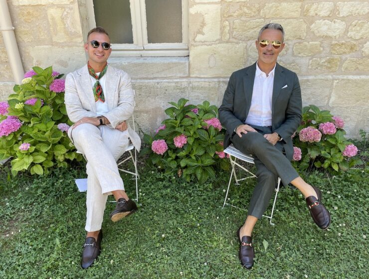 Dustin and Luigi outside their home in an Abruzzo village after relocating from Canada to Italy