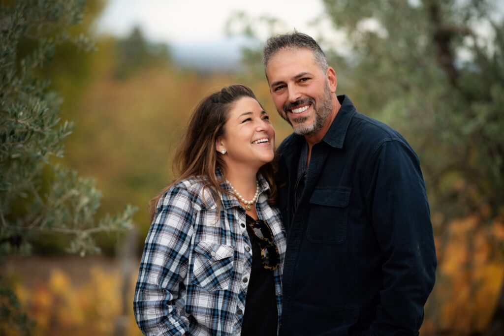 Sandy and Phil Ferretti sharing a moment during a retreat in Italy, demonstrating the warmth and authentic Total Tuscany connection.