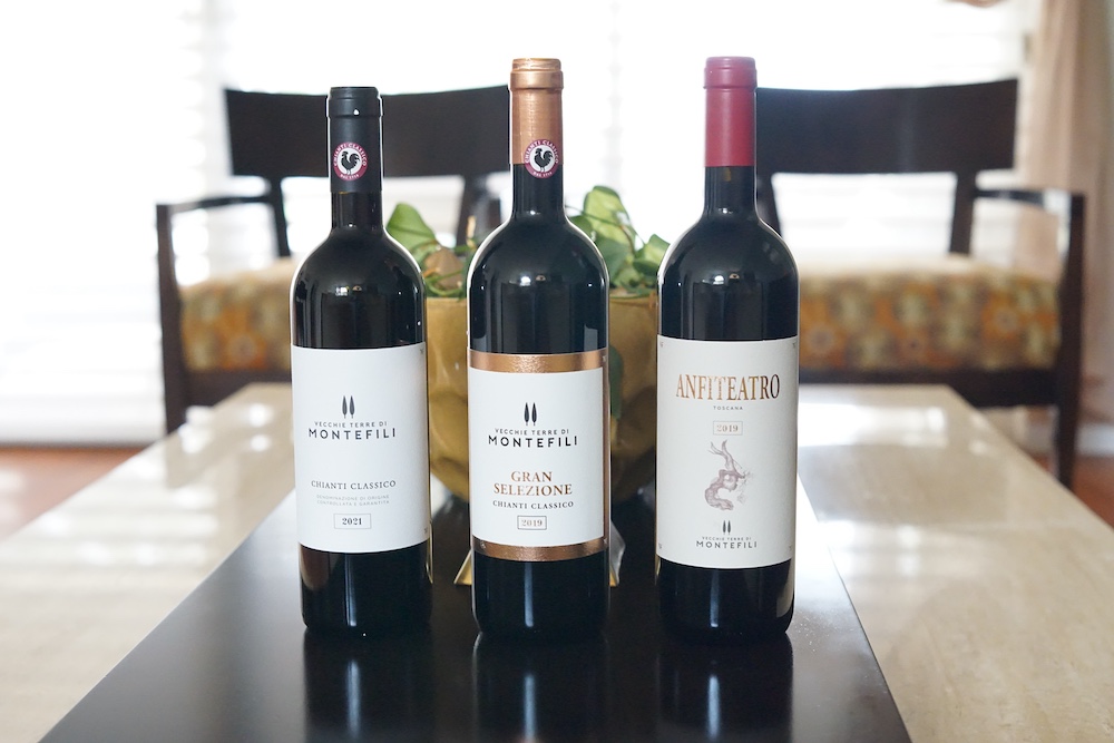 Three bottles of Vecchie Terre di Montefili red wine from Tuscany: Chianti Classico 2021, Gran Selezione 2019 and Anfiteatro 2019.