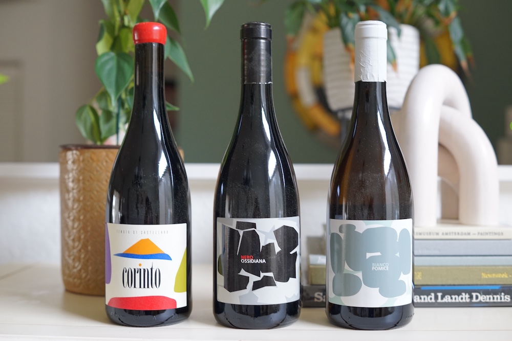 Three bottles of Tenuta di Castellaro wine from Lipari in Sicily's Aeolian Islands: Corinto, Nero Ossidiana and Bianco Pomice.