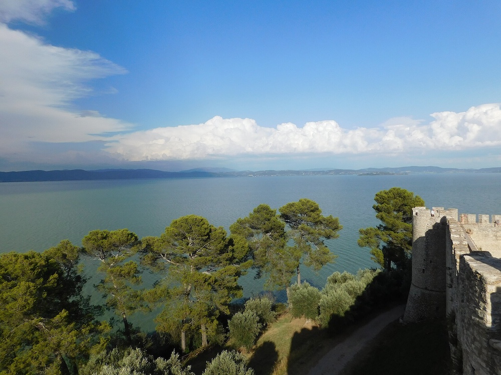 Panoramic view of Lake Trasimeno from Castiglione del Lago in Umbria, Italy.