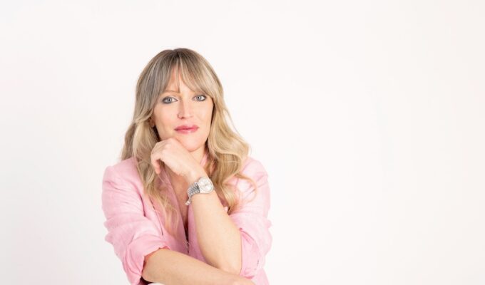 Cristina Mercuri MW, Italy’s first female Master of Wine, photographed in a pink blazer